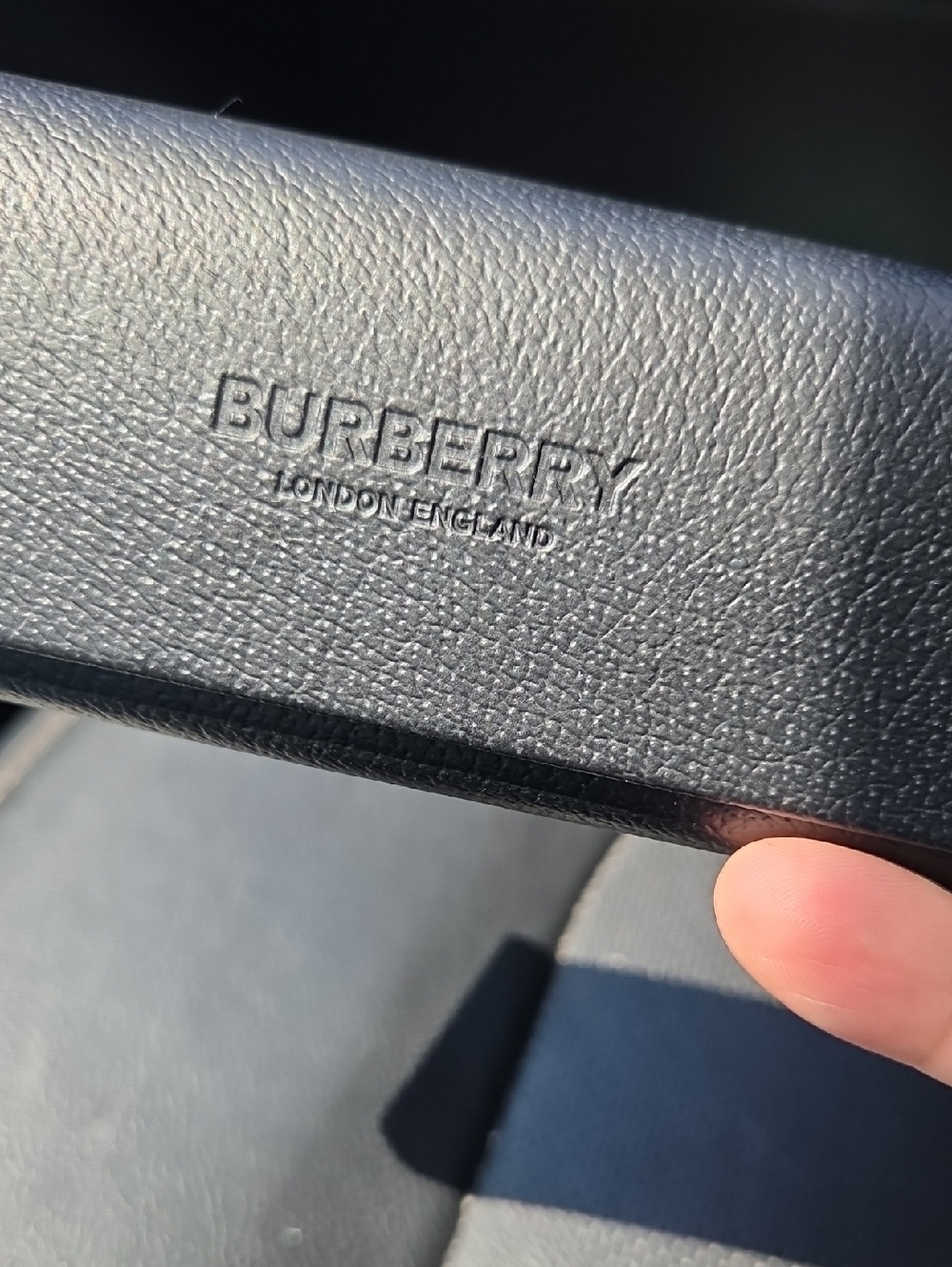 Burberry glasses case.
